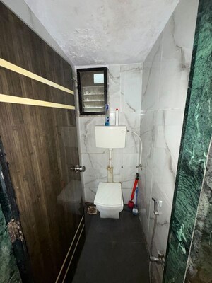 Bathroom in 2 BHK Apartment at RNA NG Paradise, Mira Road – for Rent