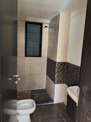 Bathroom in 2 BHK Apartment at Acropolis Purple Nine Hills, Kondhwa – for Rent