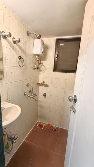 Bathroom in 1 BHK Apartment at Sanjay Gandhi Nagar CHS, Malad East – for Rent