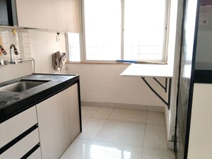 Kitchen in 2 BHK Apartment at Kumar Samruddhi Society, Vishrantwadi – for Rent
