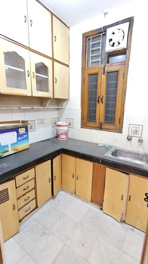 Kitchen in 2 BHK Builder Floor at Khirki Extension – for Rent