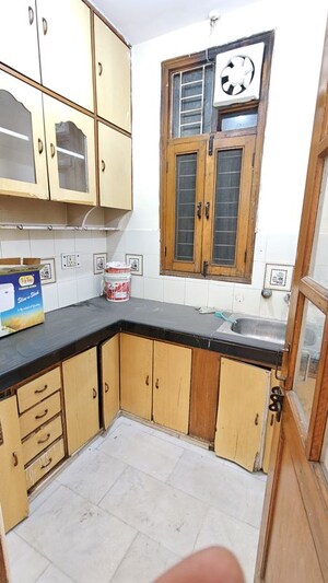 Kitchen in 2 BHK Builder Floor at Khirki Extension – for Rent