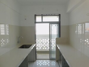Kitchen in 2 BHK Apartment at Soni Arcade, Borivali West – for Rent