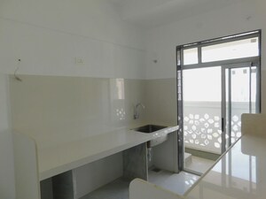 Kitchen in 2 BHK Apartment at Soni Arcade, Borivali West – for Rent