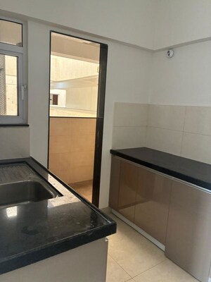 Kitchen in 3 BHK Apartment at Gera Planet Of Joy, Kharadi – for Rent