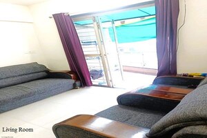 Living Room in 2 BHK Apartment at Jalan Aura County Pune, Wagholi – for Rent