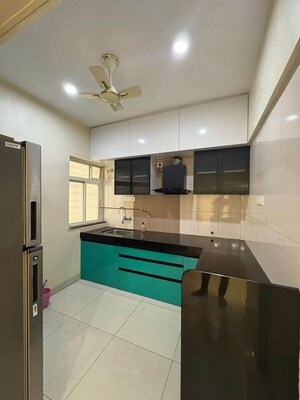 Kitchen in 2 BHK Apartment at Mukta Apartment 10th Main, Khar West – for Rent
