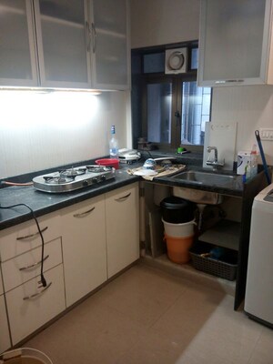 Kitchen in 2 BHK Apartment at Dindoshilla Apartment, Khar West – for Rent