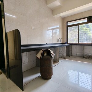 Kitchen in 2 BHK Apartment at Shree Ostwal Asha Nagar, Andheri East – for Rent