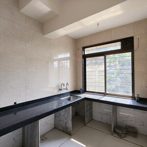 Kitchen in 2 BHK Apartment at Shree Ostwal Asha Nagar, Andheri East – for Rent