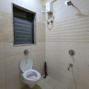 Bathroom in 2 BHK Apartment at Shree Ostwal Asha Nagar, Andheri East – for Rent