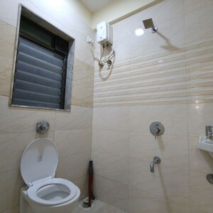 Bathroom in 2 BHK Apartment at Shree Ostwal Asha Nagar, Andheri East – for Rent