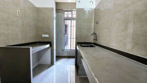 Kitchen in 2 BHK Apartment at Dosti West County, Balkum Pada – for Rent