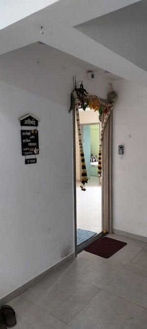 Building Lobby in 2 BHK Apartment at Shree Venkatesh Graffiti Glover, Keshav Nagar – for Rent