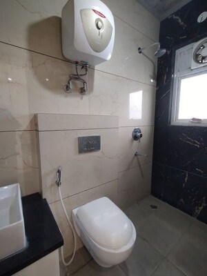 Bathroom in 4 BHK Builder Floor at Vatika India Next, Sector 82 – for Rent