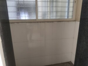 Bathroom in 2 BHK Apartment at Sharada Myria, Dhayari – for Rent