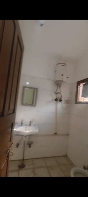 Bathroom in 2 BHK Apartment at RWA Apartments Sector 21, Sector 21 – for Sale