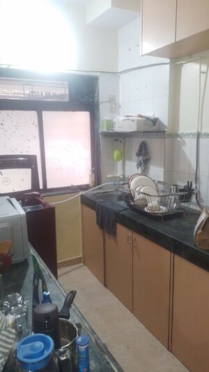 Kitchen in 1 BHK Apartment at Neel Sarovar, Andheri East – for Rent