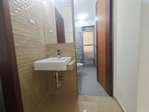 Bathroom in 2 BHK Apartment at Paradise Lifespaces Sai World City, New Panvel – for Rent