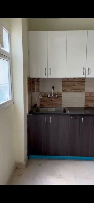Kitchen in 3 BHK Apartment at Amrapali Enchante, Tech Zone 4 Greater Noida – for Sale