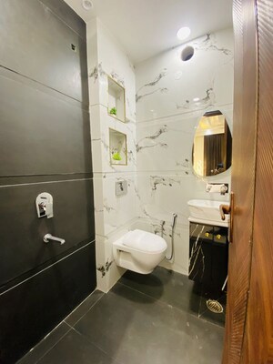 Bathroom in 4 BHK Builder Floor at Dwarka Mor – for Sale