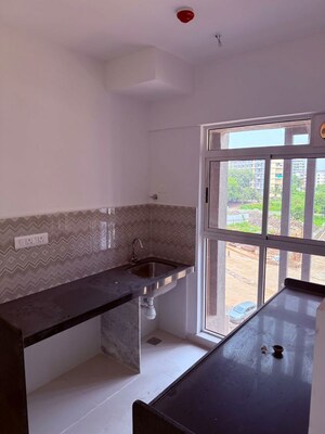 Kitchen in 2 BHK Apartment at Lodha Codename Premier, Dombivli East – for Rent