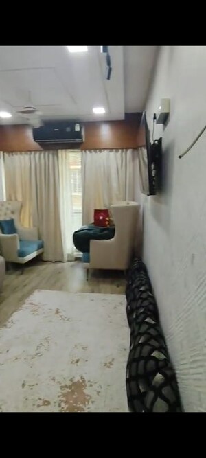 Living Room in 3 BHK Apartment at Andheri CHS, Andheri West – for Rent