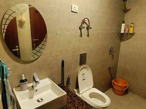 Bathroom in 1 BHK Apartment at Sunworld Arista, Sector 168 – for Rent