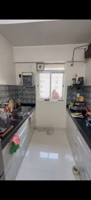 Kitchen in 1 BHK Apartment at Lodha Amara, Kolshet Road – for Sale
