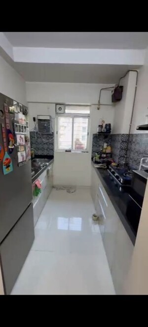 Kitchen in 1 BHK Apartment at Lodha Amara, Kolshet Road – for Sale