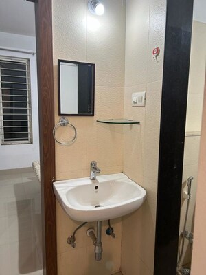 Bathroom in 1 BHK Apartment at Arin Apartment, Veerabhadra Nagar – for Rent