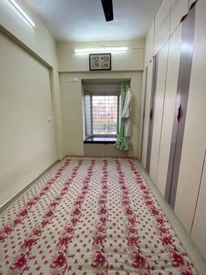 Bedroom in 1 BHK Apartment at Garnet Chamber, Umerkhadi – for Sale