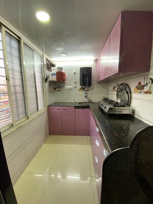 Kitchen in 1 BHK Apartment at Garnet Chamber, Umerkhadi – for Sale