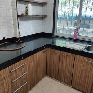 Kitchen in 1 BHK Apartment at Sukumar CHS, Vile Parle East – for Rent
