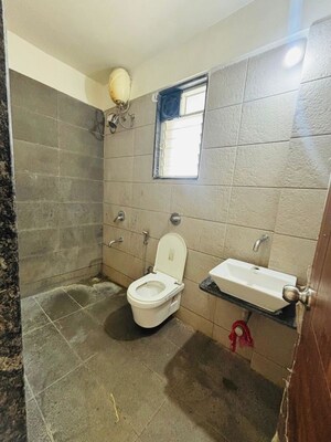 Bathroom in 2 BHK Apartment at Royal Yogville, Dhayari – for Rent