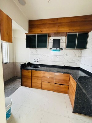 Kitchen in 2 BHK Apartment at Royal Yogville, Dhayari – for Rent