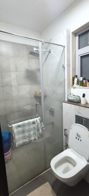 Bathroom in 1 BHK Apartment at Piramal Revanta, Mulund West – for Rent