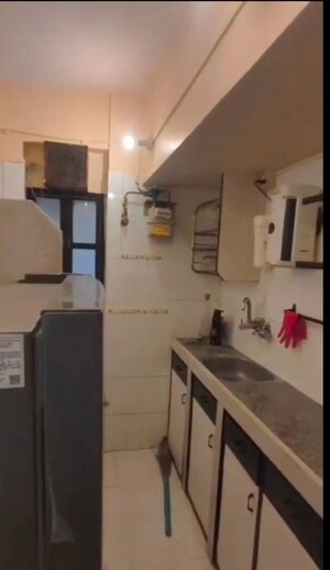 Kitchen in 1.5 BHK Apartment at Grotto Apartment, Bandra West – for Rent